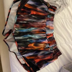 Multi-colored lulu lemon 2.5” shorts.